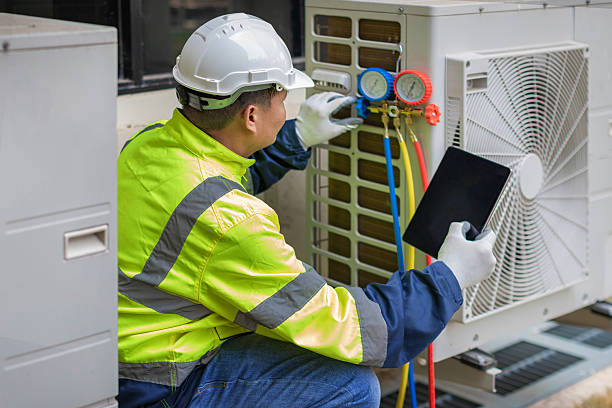 Professional Ac Installation technician working in Port Washington, WI